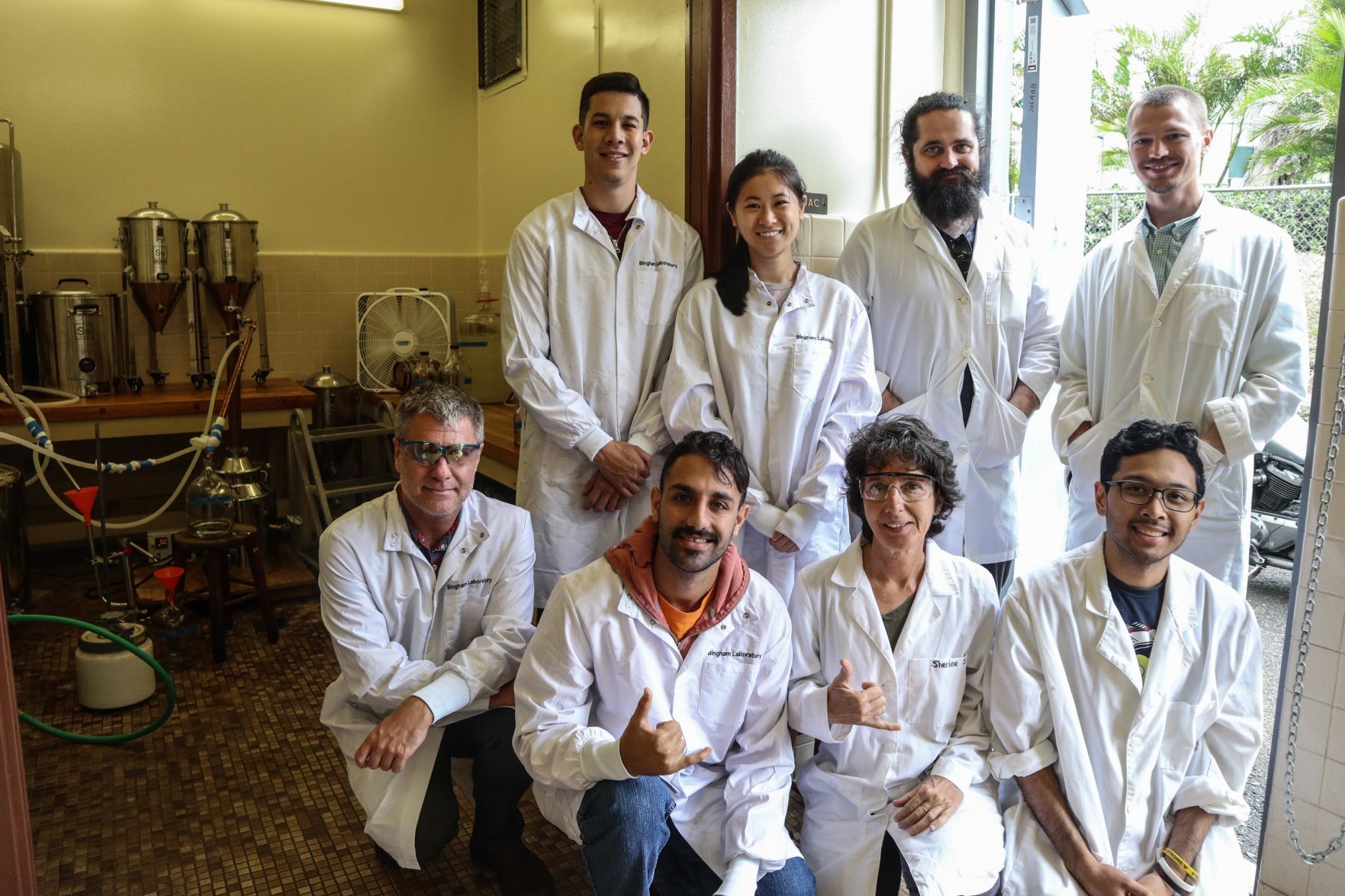 Biochemistry graduate class creating hand sanitizers
